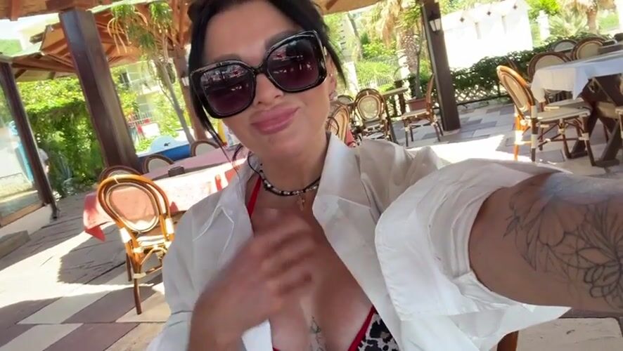 Women enjoy beachside lunch, take selfies in Montenegro