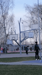 Afternoon basketball activity observed at Riga park court