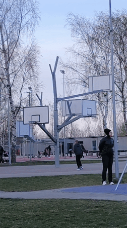 Afternoon basketball activity observed at Riga park court