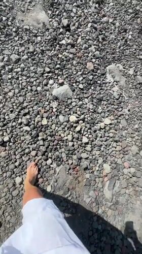 Early morning tourist activities documented on Karangasem volcanic beaches