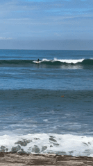 Early morning surfing session captured off Kediri coast