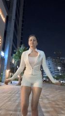 Woman exercises with jump rope at night in Dubai