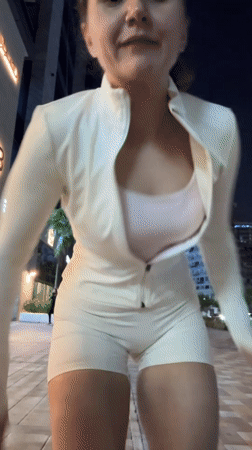 Woman exercises with jump rope at night in Dubai