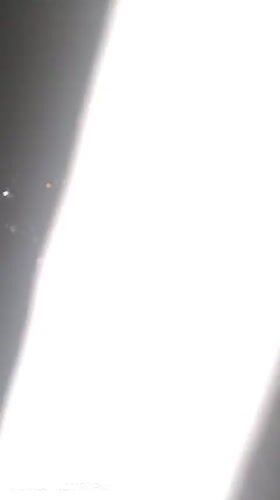 Night cityscape filmed from Caracas high-rise balcony