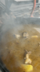 Outdoor cooking documented in snowy Bol'shakino, Russia