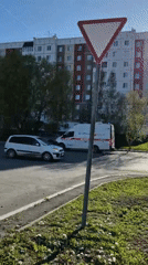 Emergency vehicle responds in Tobolsk during sunny afternoon