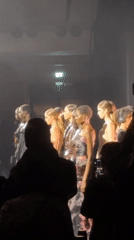 Fashion show finale captured with models, audience recording in Paris