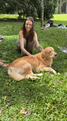 Couple enjoys early morning park time with golden retriever