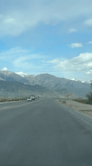 Mountain highway drive captured in Frunzenskoe, Kyrgyzstan