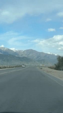 Mountain highway drive captured in Frunzenskoe, Kyrgyzstan