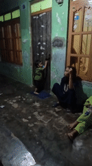 Quiet afternoon at a family home in Tanahbaya, Indonesia