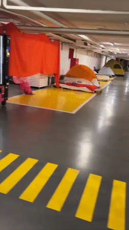 Underground Tel Aviv parking garage converted to tent shelter