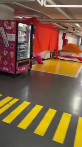 Underground Tel Aviv parking garage converted to tent shelter