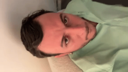 Man lip-syncs to music while filming video in London
