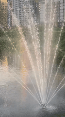 Fountain creates rainbow display in Yekaterinburg park pond