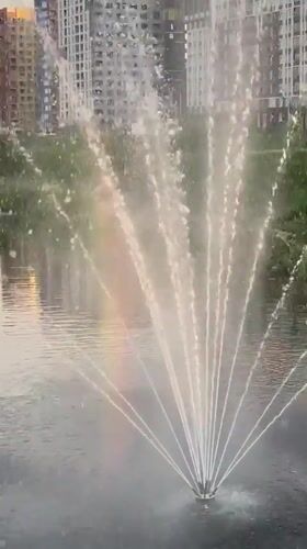 Fountain creates rainbow display in Yekaterinburg park pond
