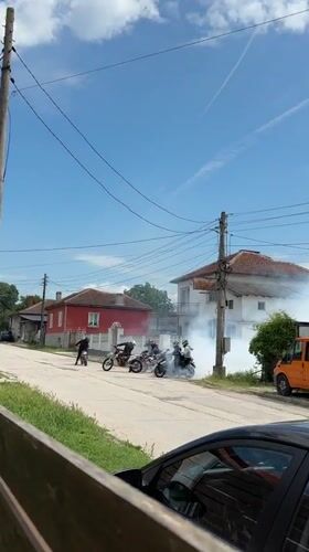 Motorcyclists perform street stunts in Bulgarian residential area