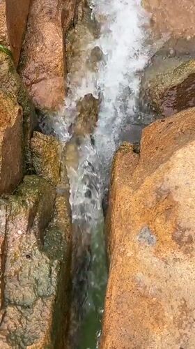 Littered waterfall site in Jos shows beauty and pollution side by side