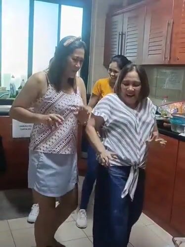 Four women dance in Dubai kitchen