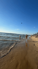 Paddleball game on sunny Tel Aviv beach