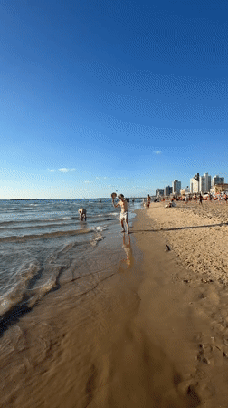 Paddleball game on sunny Tel Aviv beach