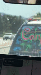 Vehicle spotted with neon window customization in Coachella Valley