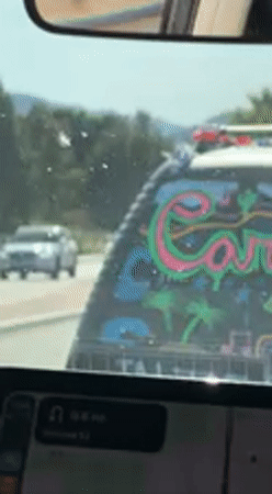 Vehicle spotted with neon window customization in Coachella Valley