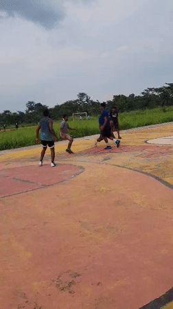 Basketball game captured on outdoor court in Egbagu, Nigeria