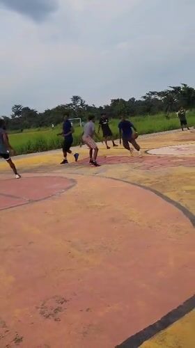 Basketball game captured on outdoor court in Egbagu, Nigeria