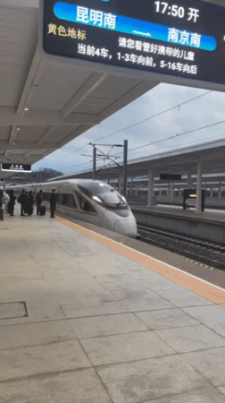 High-speed train serves passengers at Jinhua station platform