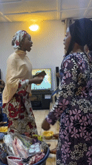 Baby celebration gathering in Jos with traditional attire