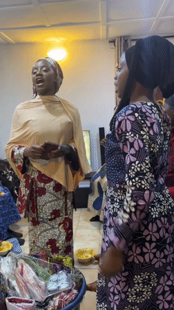 Baby celebration gathering in Jos with traditional attire