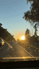 Evening traffic observed on rural road in Sin'kovo, Russia