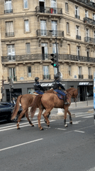 Mounted police patrol Paris streets on horseback