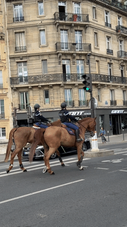 Mounted police patrol Paris streets on horseback