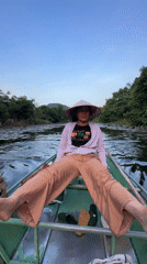 Tourist boat excursions navigate scenic Vietnamese karst waterways