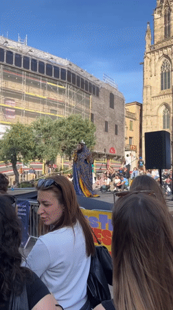 Costumed performer draws crowd in Barcelona public square
