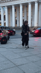 Street band performs live on Nevsky Prospekt near Singer House