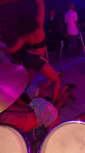 Live music performance with dancers captured at Howayi nightclub