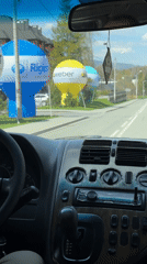 Driver travels through residential area in Wisła, Poland