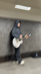 Street musician performs in Moscow Metro subway tunnel