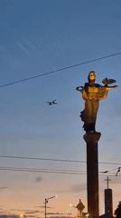Saint Sofia statue glowing at twilight in Bulgaria's capital