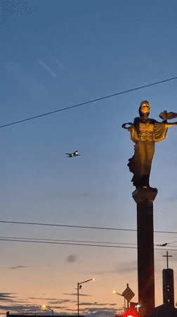 Saint Sofia statue glowing at twilight in Bulgaria's capital