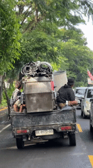 Loaded pickup truck caught in traffic in Kuta Selatan