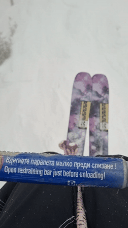 Ski lift ride captured during snowfall in Bansko
