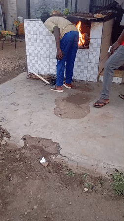 Street food stalls and market activity in Jos, Nigeria