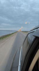 Sunset drive along Kama River documented in Chaikovsky, Russia