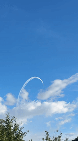 Looping contrail over Carnikava and a mirror selfie moment