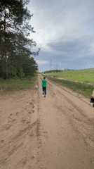 Family enjoys afternoon walk with dog in Noviy, Russia