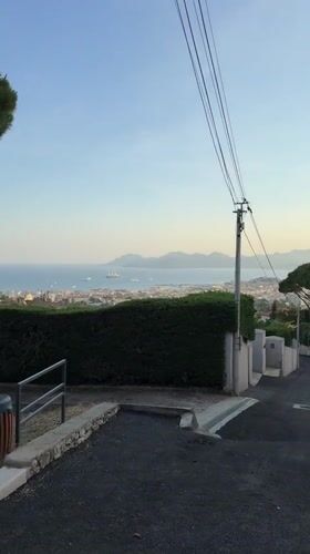 Evening stroll documented through scenic Cannes neighborhoods and coastal views
